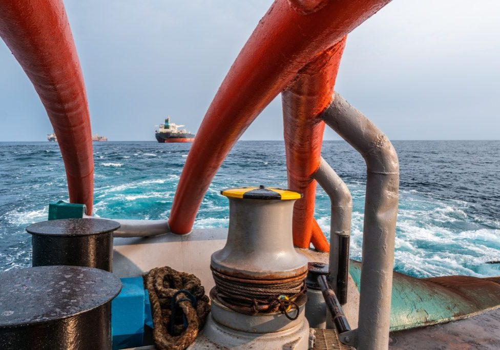 mooring equipment of ship. View from ahts vessel deck during tanker lifting. Beautiful seascape