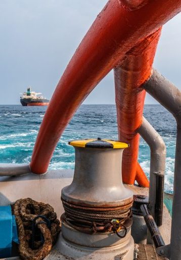 mooring equipment of ship. View from ahts vessel deck during tanker lifting. Beautiful seascape
